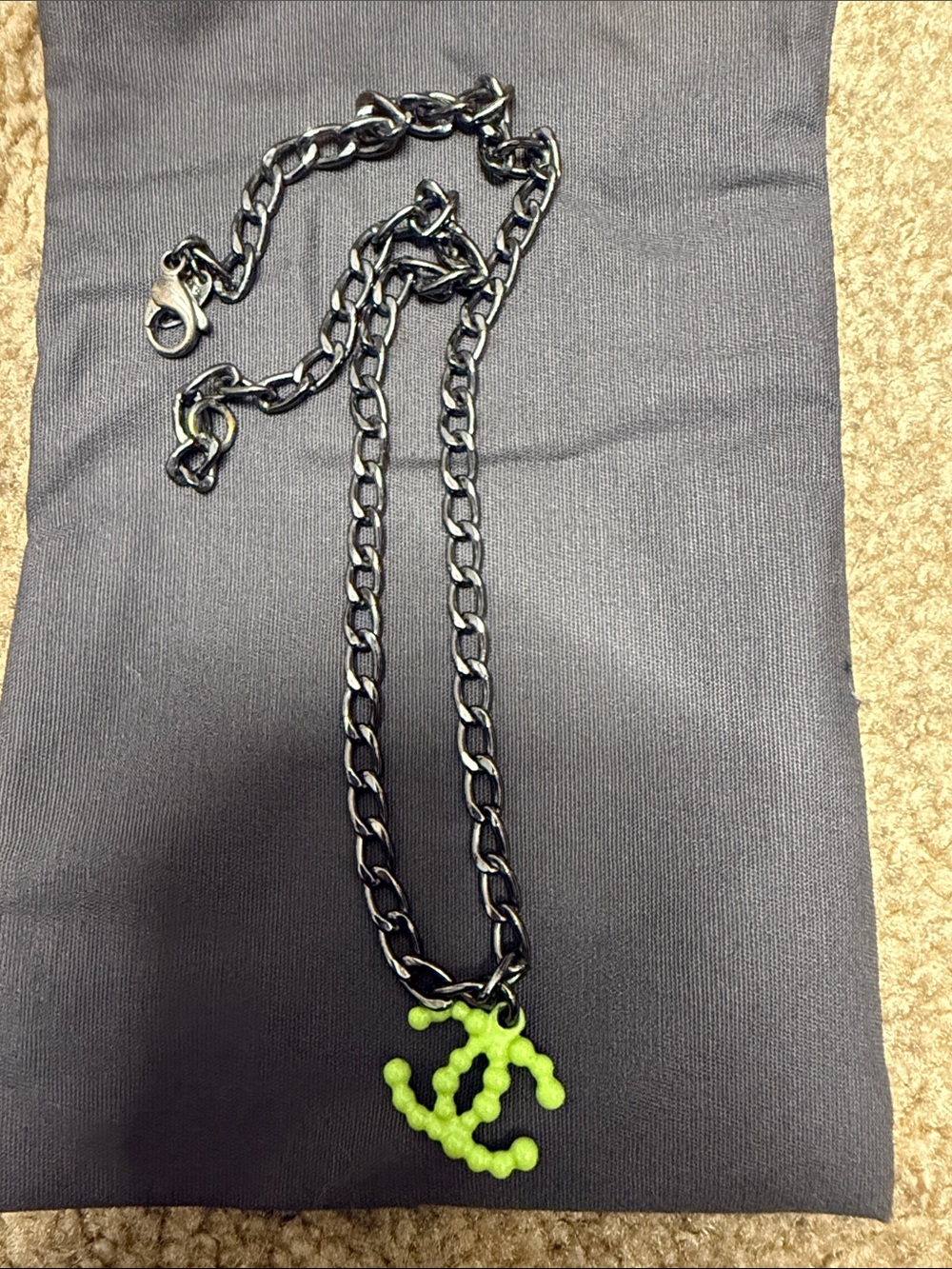 CHANEL Black Chain Necklace with Neon Green CC Pendant